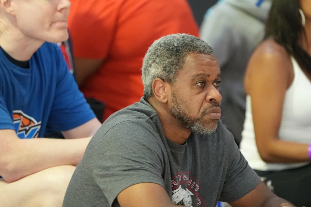 Portrait of a male senior interview coach